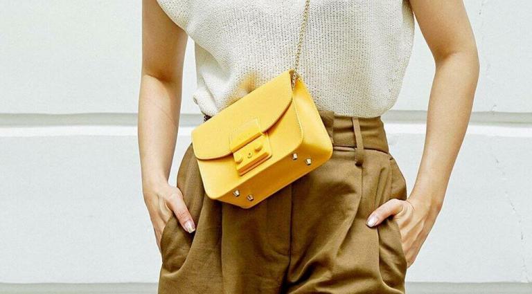 Outfit aperitivo: trasforma il look cambiando borsa